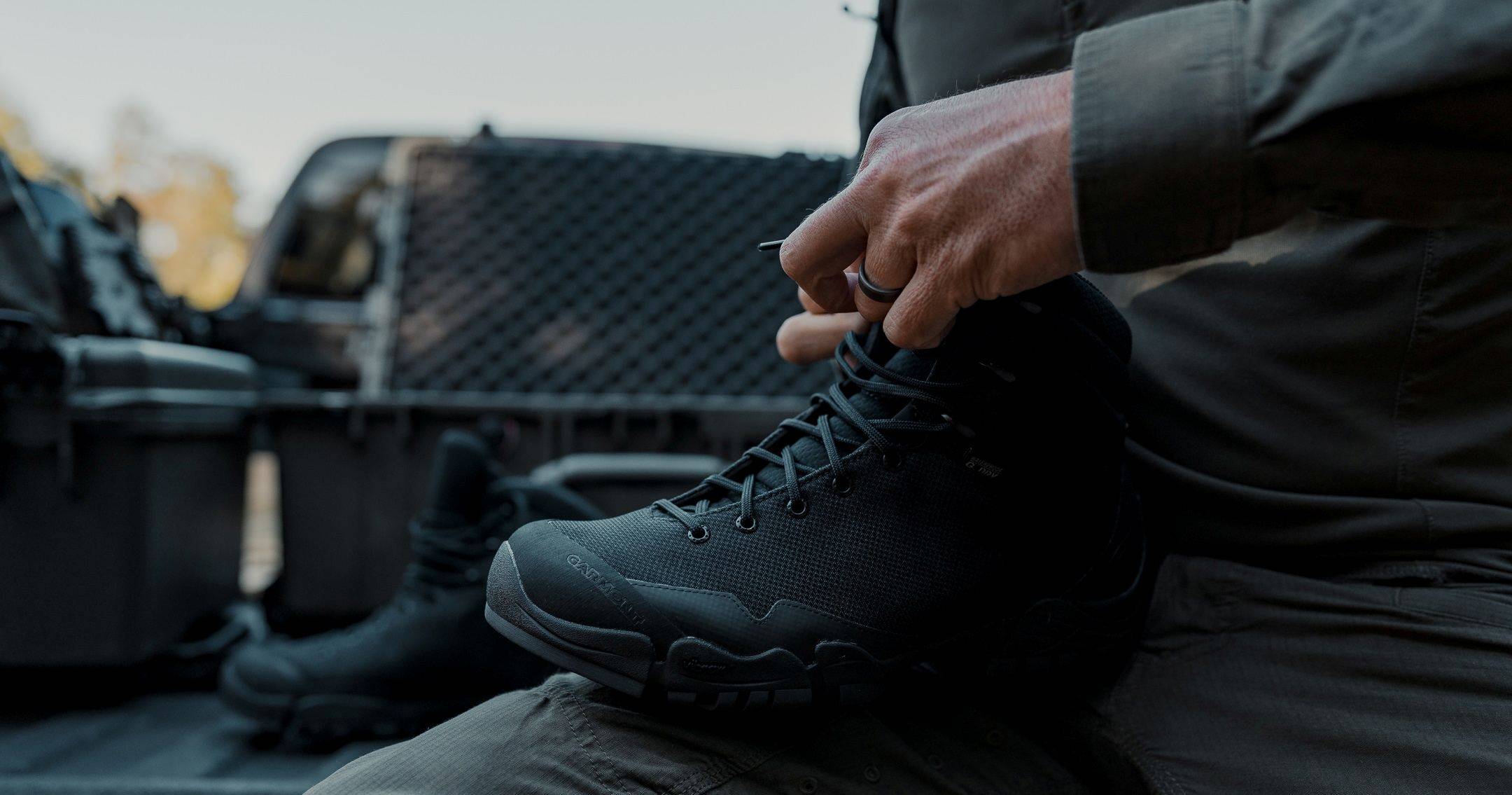 Close up tying tactical boots